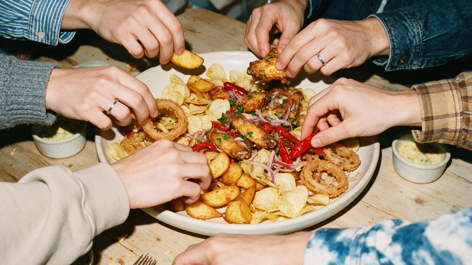 Friends sharing a platter together